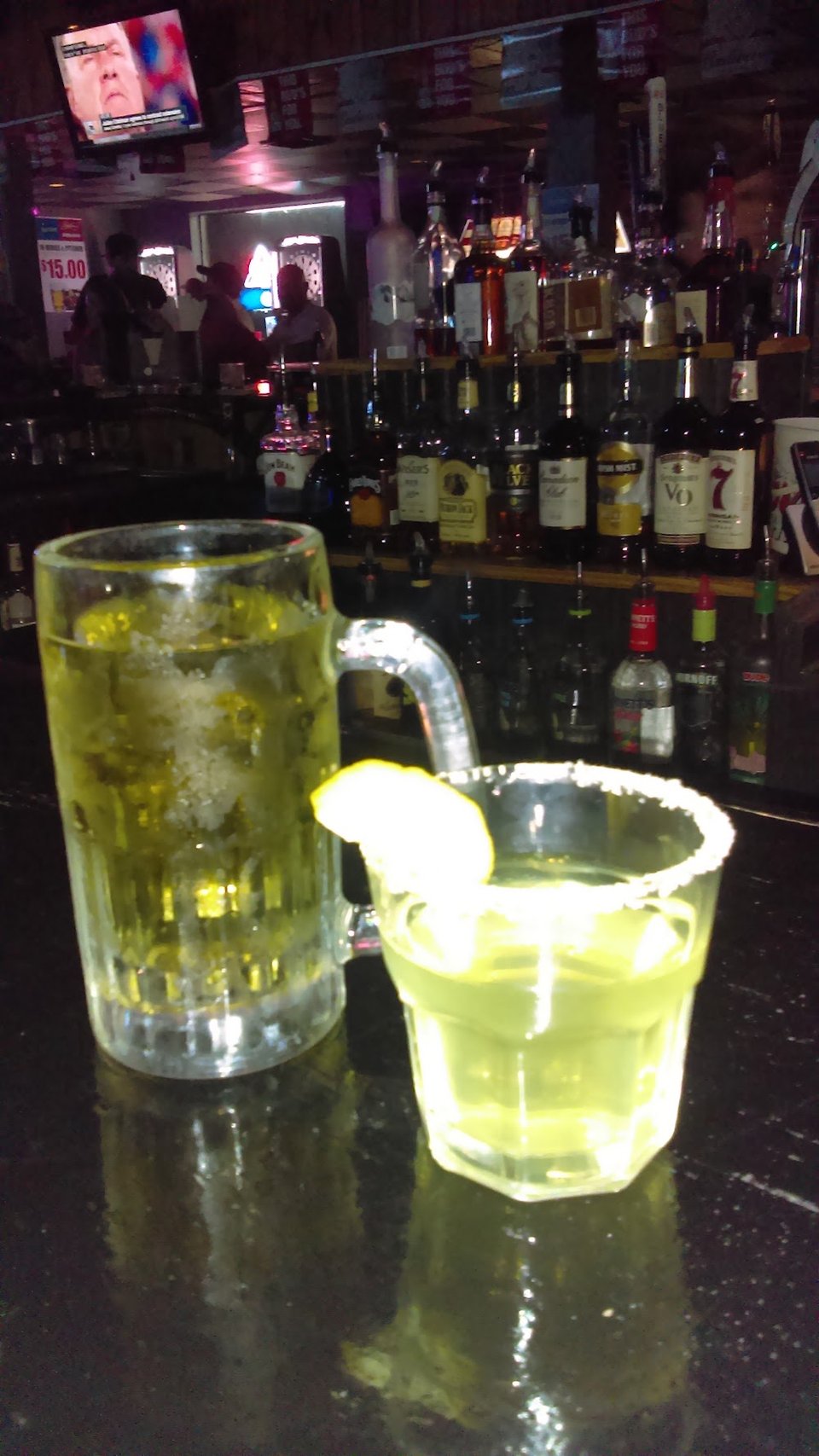 Specials sheet with drinks and shots.